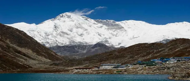 Gokyo lake and glacier with mountains background.
